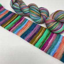 Load image into Gallery viewer, Self striping sock yarn- Weird is Cool, Man
