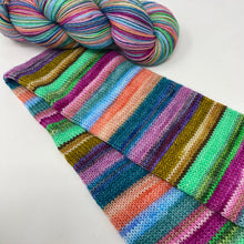 Load image into Gallery viewer, Self striping sock yarn- Weird is Cool, Man
